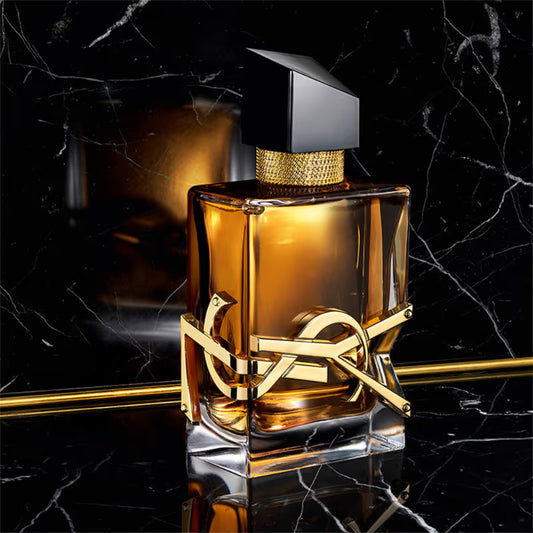 Luxury perfume bottle with gold accents on a black marble background Yves Saint Laurent Libre Eau de Parfum Intense 90 ml (3 fl.oz)