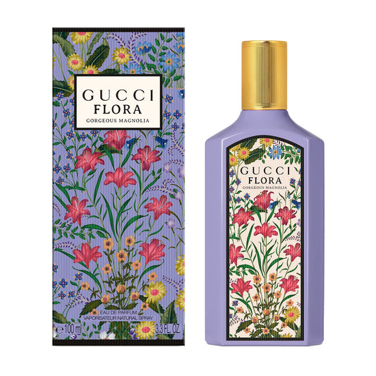 Gucci Flora perfume bottle and packaging with floral design on a white background Gucci Flora Gorgeous Magnolia Eau de Parfum 100 ml (3.4 fl.oz)
