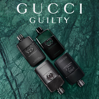 Gucci Guilty perfume bottles on a green marble background Gucci Guilty Black Pour Homme Eau de Toilette 90 ml (3 fl.oz)