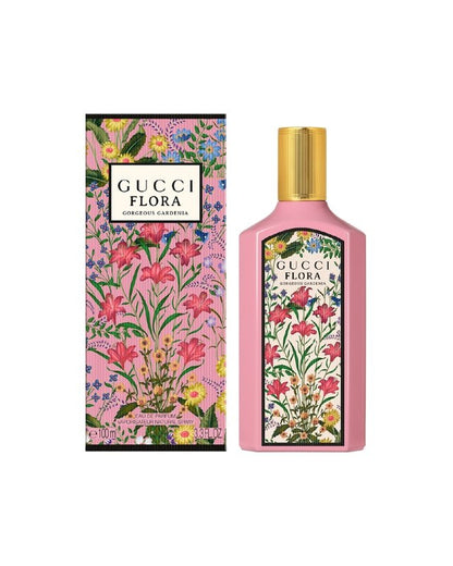 Gucci Flora perfume bottle and packaging with floral design on a white background