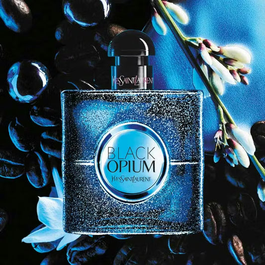 YSL Black Opium perfume bottle with flowers and dark background Yves Saint Laurent Black Opium Eau de Parfum Intense 90 ml (3 fl.oz)