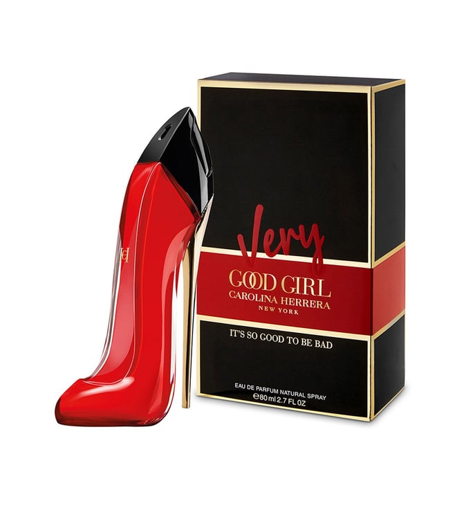 Red high-heeled shoe-shaped perfume bottle with 'Very Good Girl' packaging on a white background