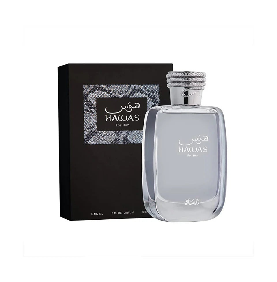 A bottle of Rasasi Hawas EDP 100ml perfume for men, with a clear, sleek design and a black box in the background featuring Arabic script.