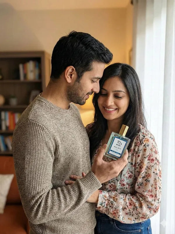 Man and woman holding a perfume bottle together indoors Red Vocal Aalien Premium Perfume Eau De Toilette 50ml – Long Lasting Unisex with Woody Amber Notes