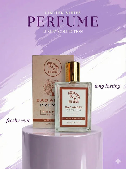 Perfume bottle and packaging with 'Red Vocal' branding on a purple  
Red Vocal Bad Angel Premium Perfume Eau De Toilette for Women – 100ml Sweet, Sensual & Long-Lasting Fragrancebackground