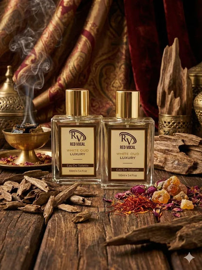 Two bottles of Red Vocal luxury perfume on a wooden surface with incense and spices.  Red Vocal White Oud Luxury Premium Perfume Eau De Toilette – Unisex 100ml Bold & Long-Lasting Set of 2 Fragrance 
