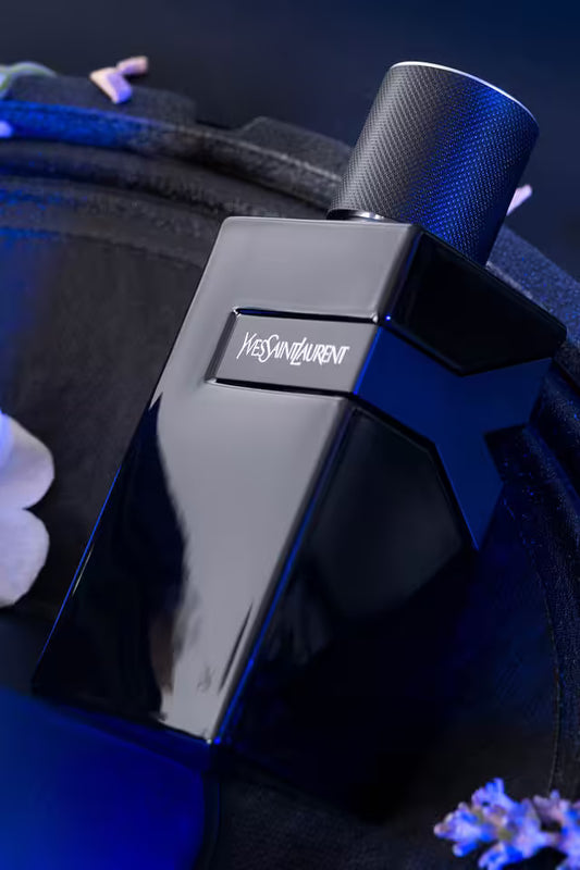 Yves Saint Laurent perfume bottle with a blue cap on a dark background Yves Saint Laurent Y Le Parfum 100 ml (3.3 fl.oz)