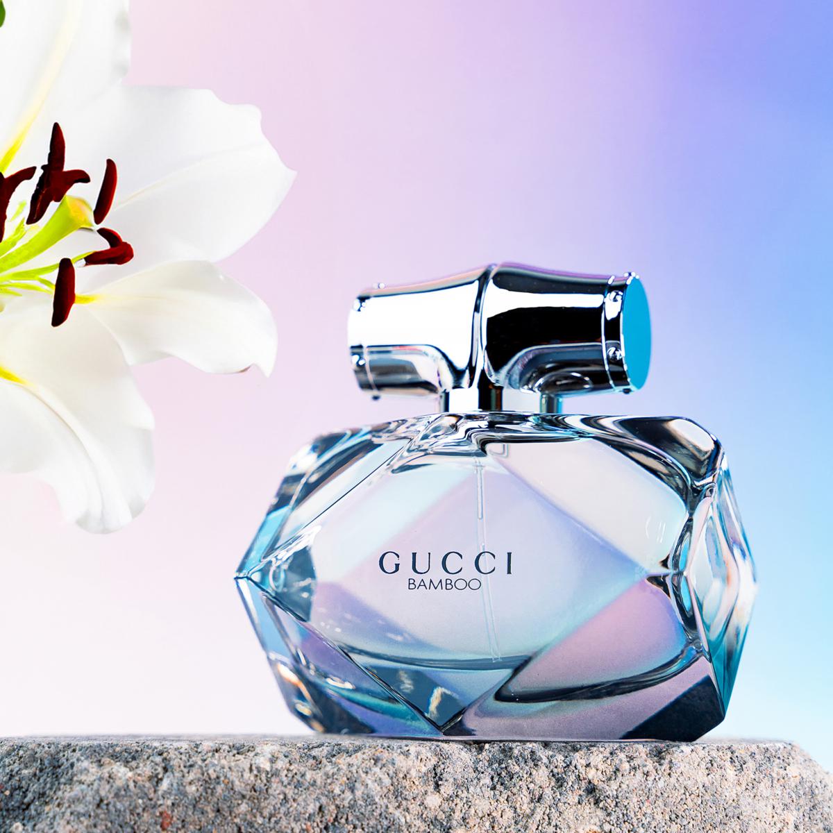 Gucci Bamboo perfume bottle with a flower on a gradient backgroundGucci Bamboo Eau de Parfum 75 ml (2.5 fl.oz)