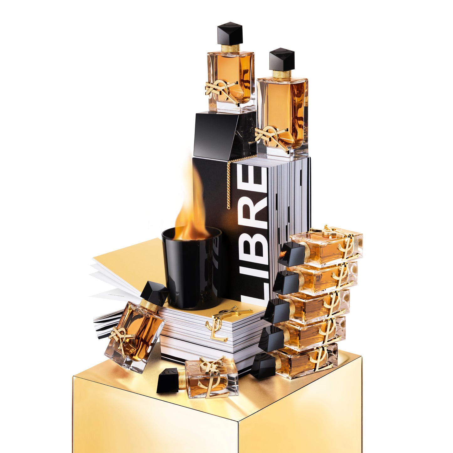 Collection of perfume bottles and packaging on a reflective surface with 'LIBRE' branding. Yves Saint Laurent Libre Eau de Parfum Intense 90 ml (3 fl.oz)