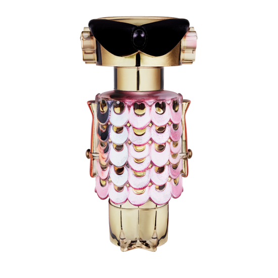 Perfume bottle with decorative cap on a pink background with flowers Paco Rabbane Fame Blooming Pink 80ml