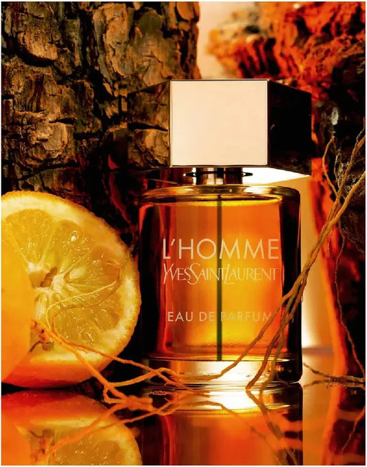 YSL L'Homme perfume bottle with a lemon and natural background Yves Saint Laurent La Nuit De L'Homme L'Intense Eau de Parfum 100 ml (3.3 fl.oz)